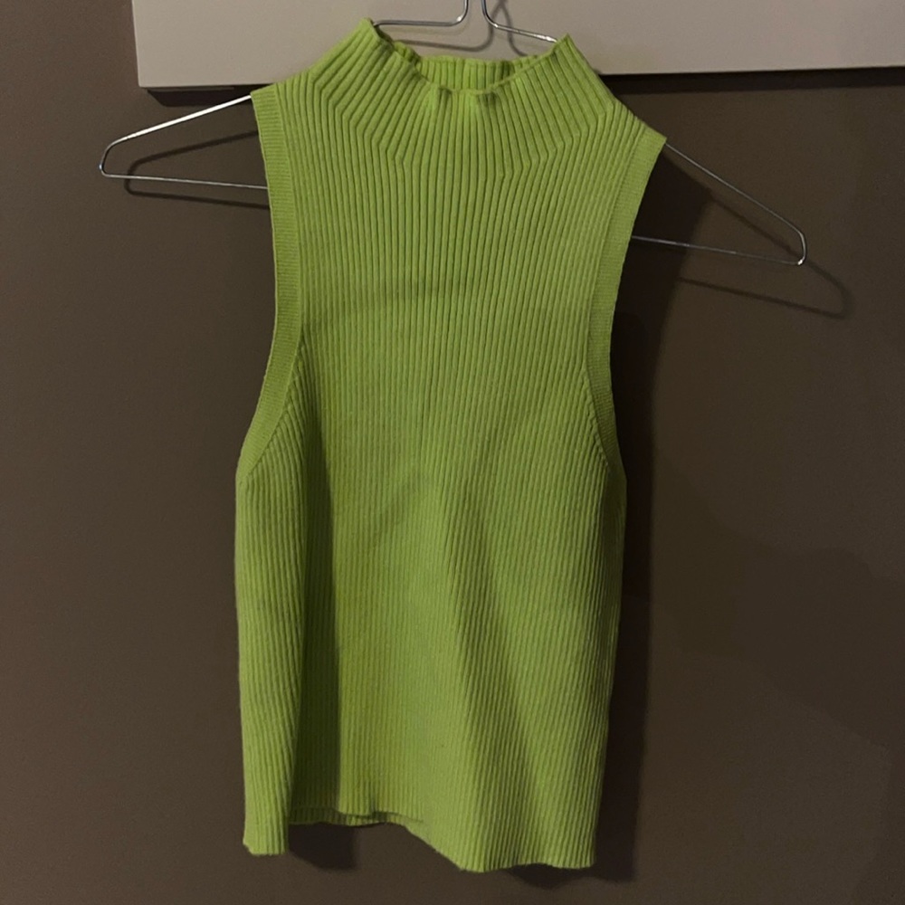 Kittenish sleeveless sweater top